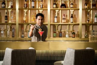 A mixologist in action at Bittersweet’s bar.