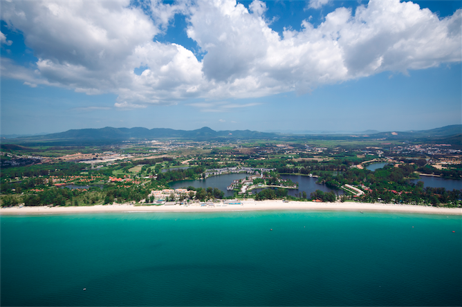 Aerial view: sea, resort, lagoon.