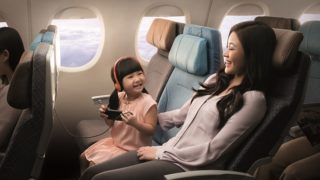 Economy class aboard a retrofitted Singapore Airlines Boeing 777-300ER.