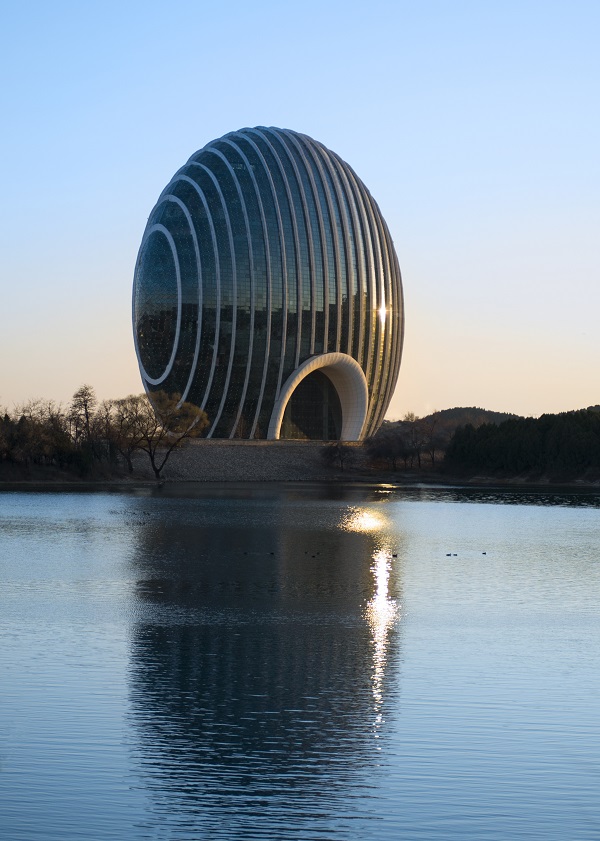 Shaped round like a rising sun, the hotel symbolizes harmony and fortune.