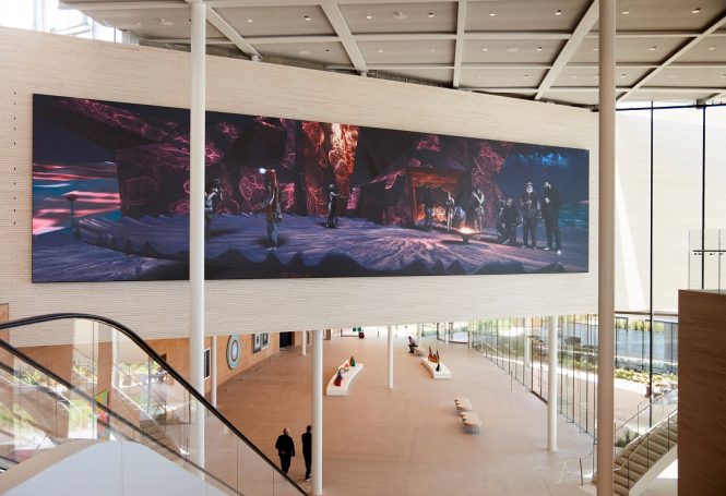 Maori artist Lisa Reihana’s moving-image installation GROUNDLOOP overlooks the central atrium. 