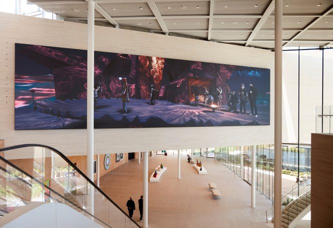 Maori artist Lisa Reihana’s moving-image installation GROUNDLOOP overlooks the central atrium.
