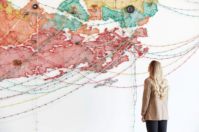 Woven chronicle, an installation by Mumbai-based visual artist Reena Saini Kallat, is being shown as part of the “Making Worlds” exhibition.