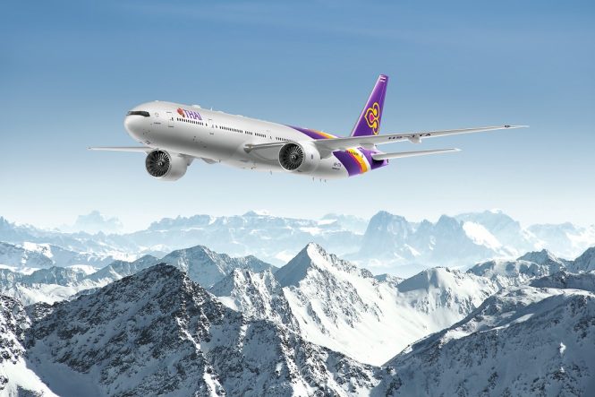 A Thai Airways jet over the Alps.