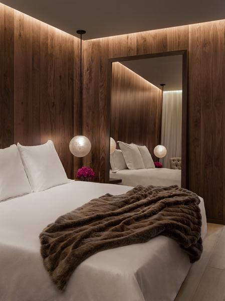 The hotel's rooms evoke the feeling of a cabin on a private yacht.