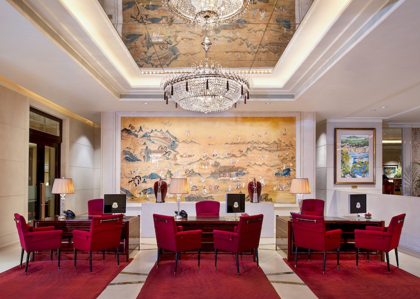 The reception area of the hotel is elegantly designed with traditional Chinese art.