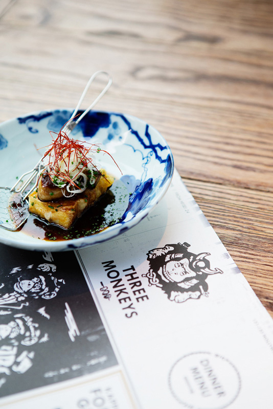 Foie gras on tempura-fried tofu toast with mirin sauce, at Three Monkeys.