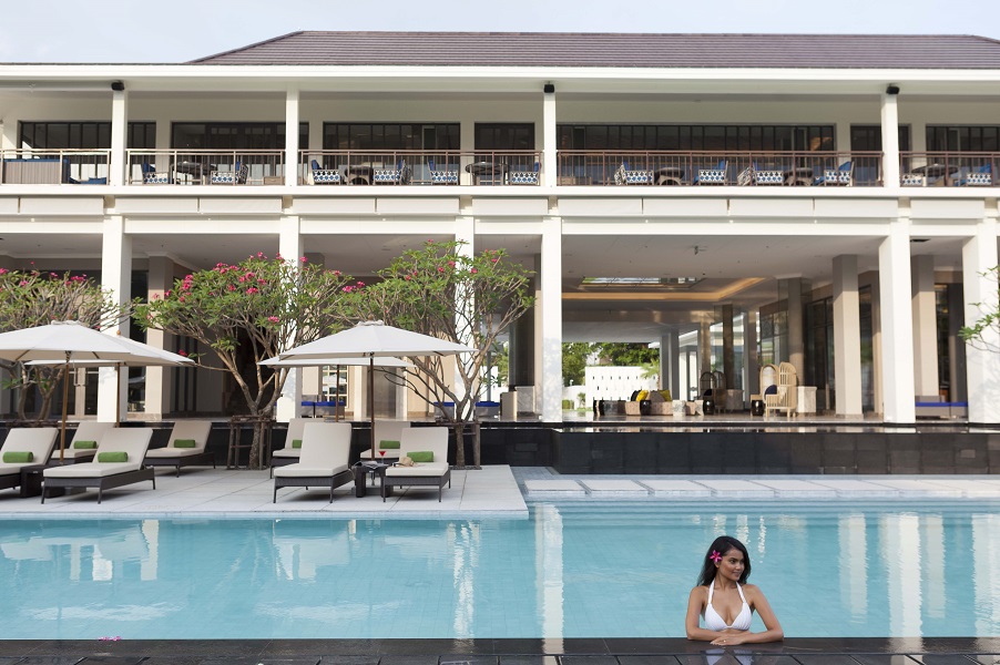 A freshwater swimming pool is sunken into the central courtyard; spa treatments are available poolside.