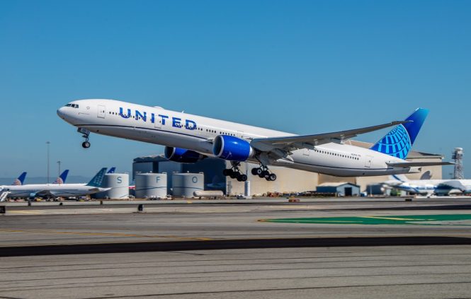 A United Airlines Boeing 777-300ER taking off at SFO. 