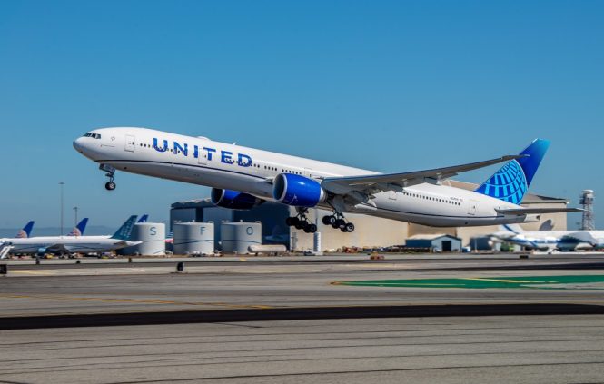 A United Airlines Boeing 777-300ER taking off at SFO.