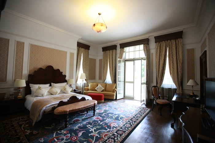 A bedroom in the historic Villa One.
