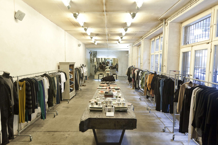 Bare racks and concrete floors display the avant-garde wares of Voo Store.