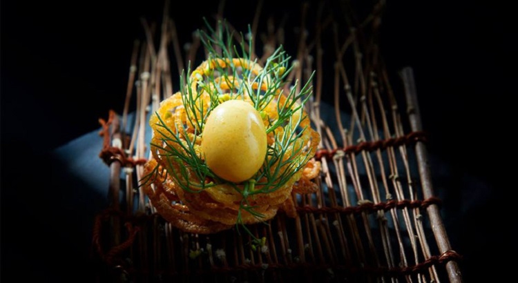 Bangkok's Gaggan restaurant attempts to revolutionize the concept of traditional Indian cuisine. 