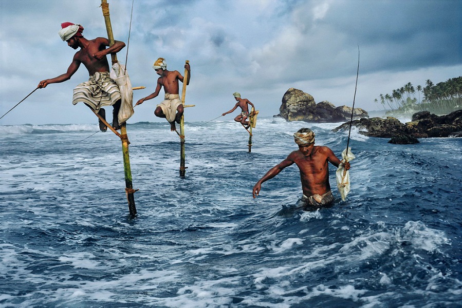 Sri Lanka's stilt-fishing tradition is captured in Steve McCurry's 